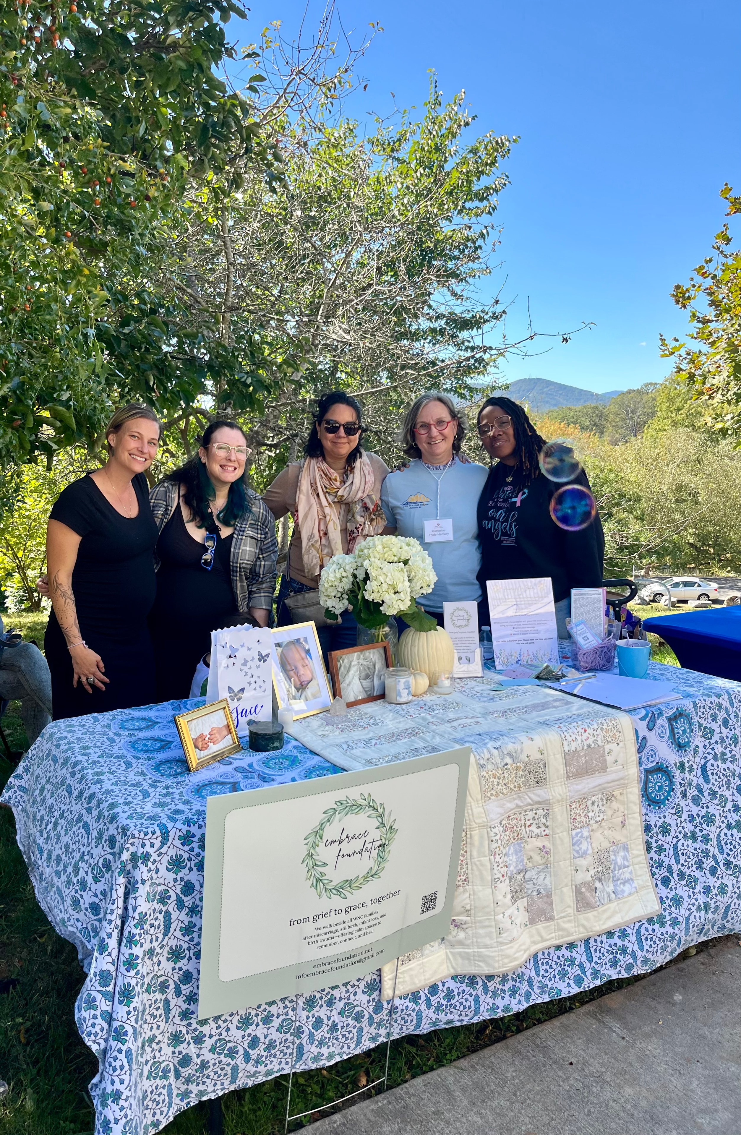 Women sitting together in a grief support circle