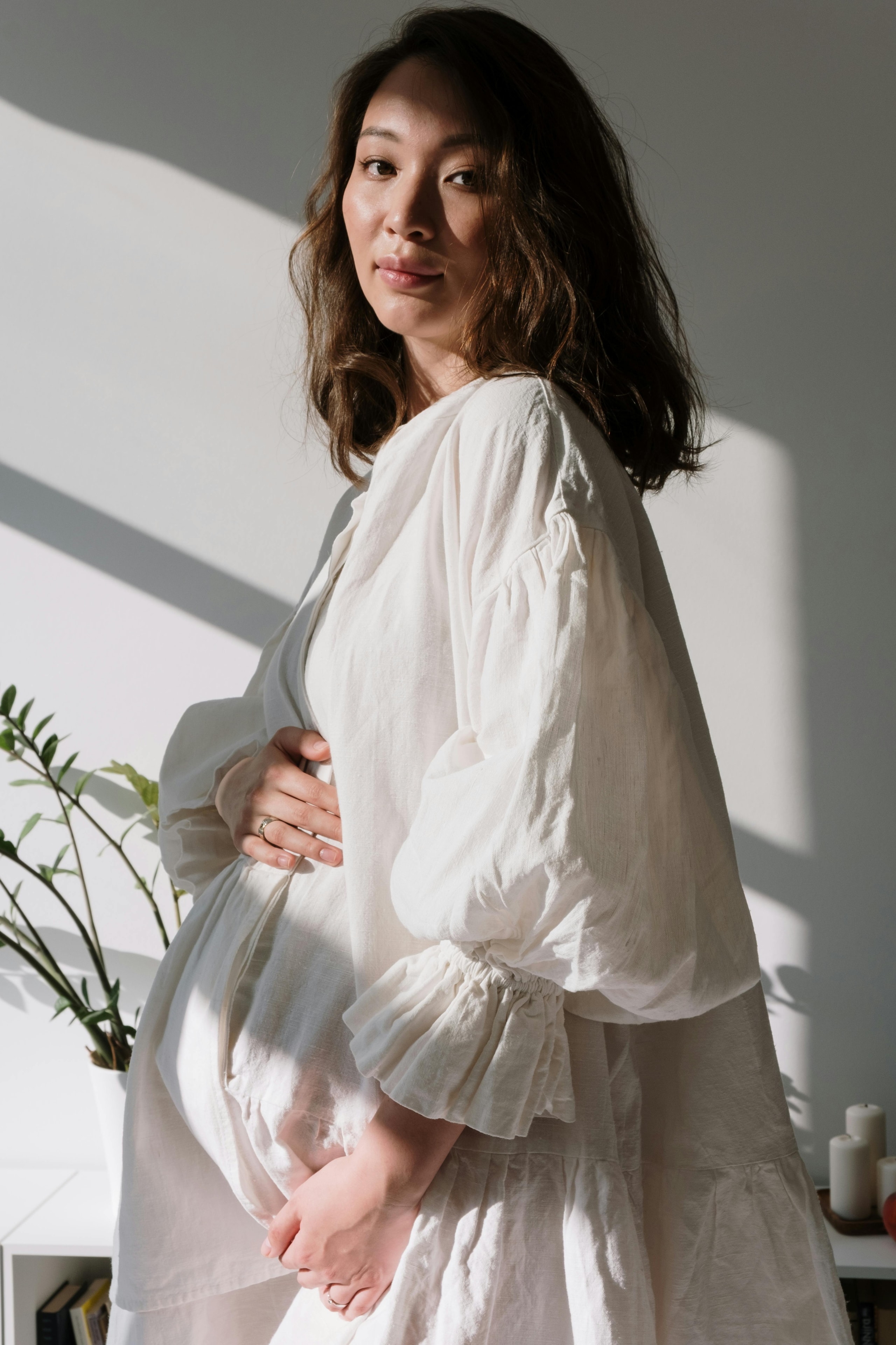 Expectant mother in soft light
